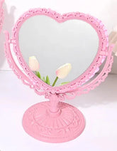 Our Cottagecore Vintage Style Heart Shaped Mirror is Intricately crafted with ornate floral and scrollwork detailing, giving the perfect, timeless cottagecore aesthetic. The silhouette adds a romantic touch to any vanity, bedroom, or entryway. 